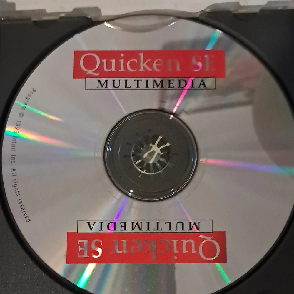 Microsoft Windows 95 and Office CD Set - Silver, Black, and Blue
